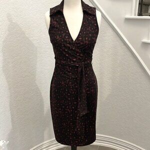 Express sleeveless wrap dress. Animal print in dark red and black. Ties @ waist.